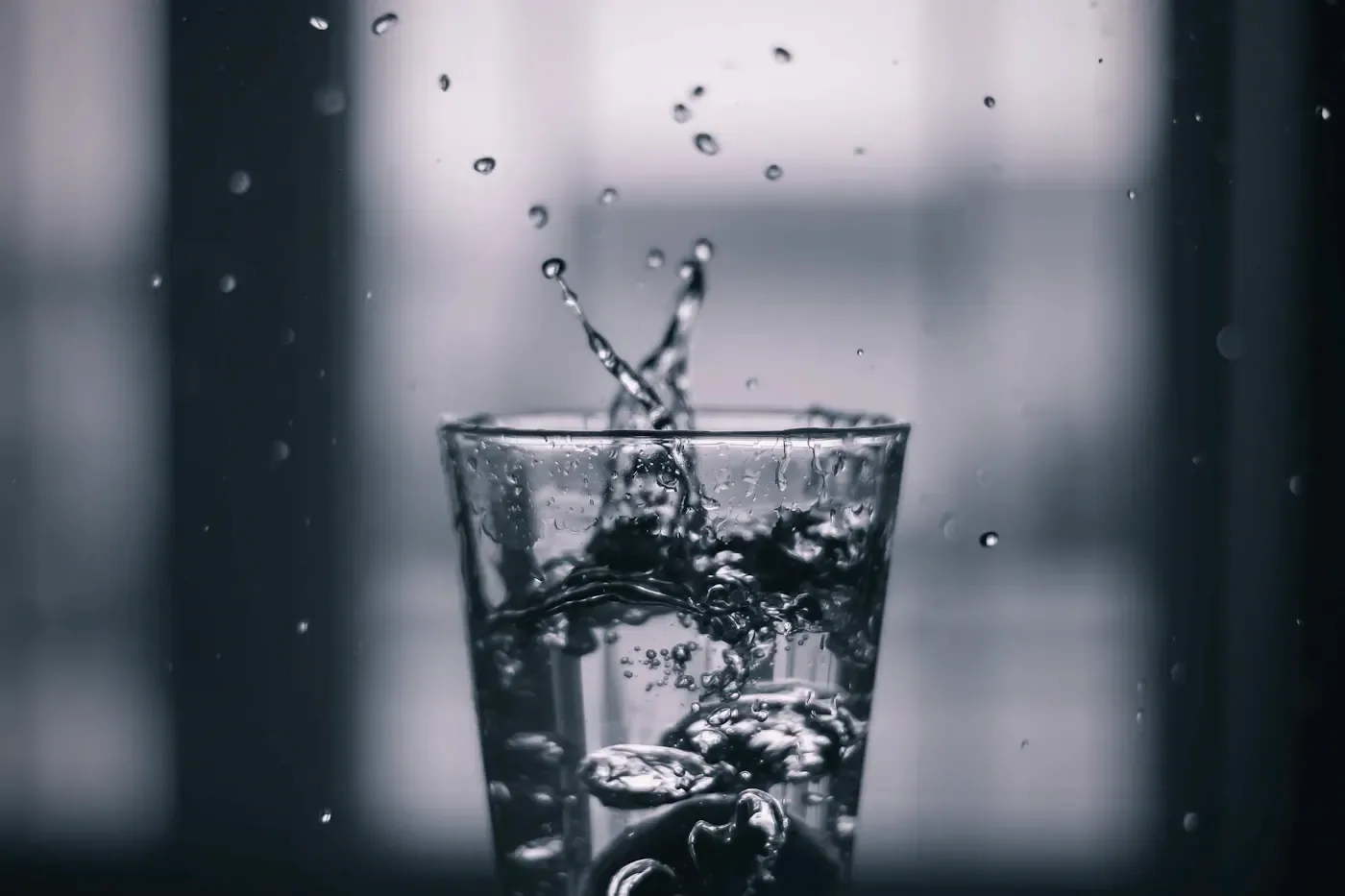 Water being poured into a glass, illustrating Erie drinking water